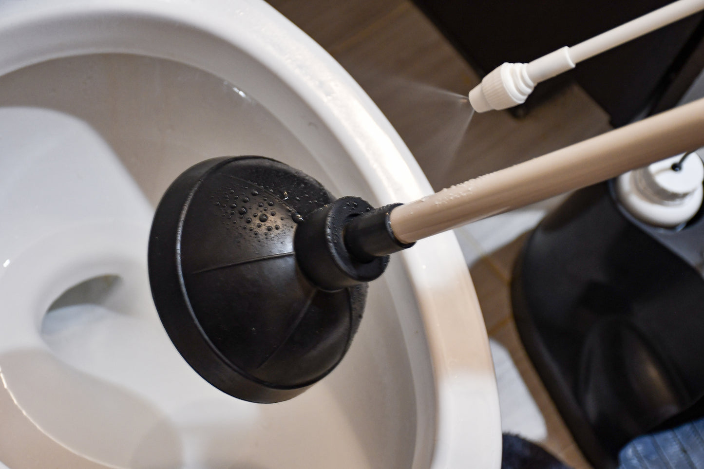 Plunger with self-cleaning mechanism.  Disinfect your plunger and your bathroom.