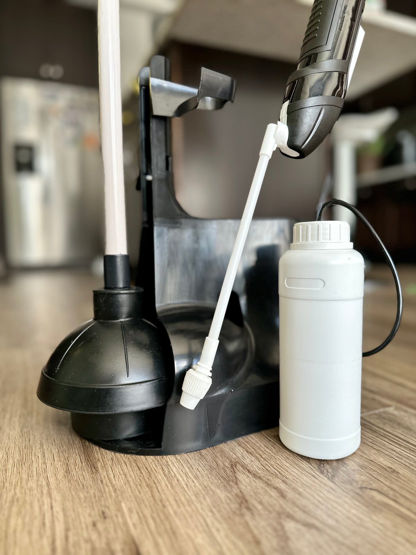 Plunger with self-cleaning mechanism. Disinfect your plunger and your bathroom.